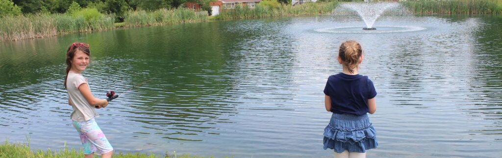 Photo of 2 girls fishing